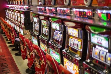 Hacksaw Gaming slot titles displayed on tko77 mobile app with game themes and volatility ratings